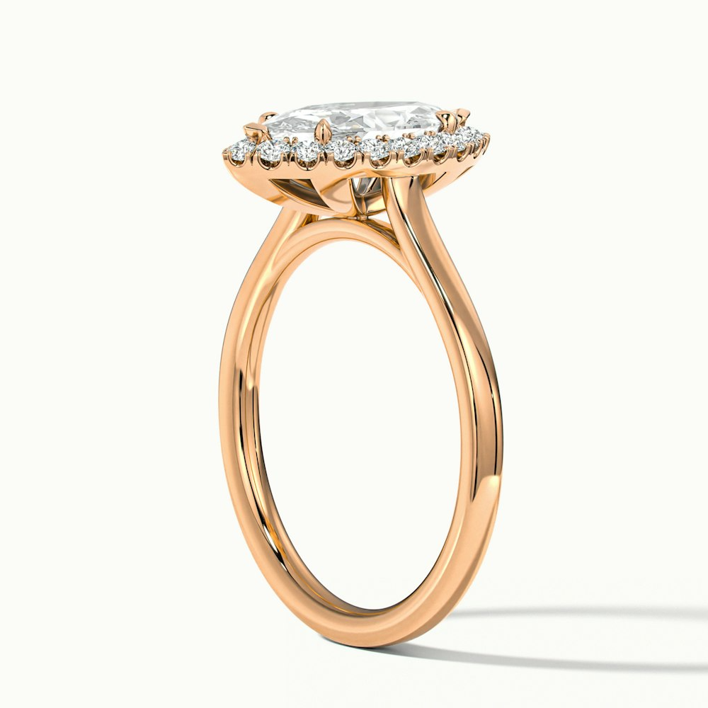 Top-down view of the Melanie Marquise Halo Wedding Ring in Rose Gold with a marquise-cut lab-grown diamond and intricate halo design, also available in moissanite and lab-grown diamond.