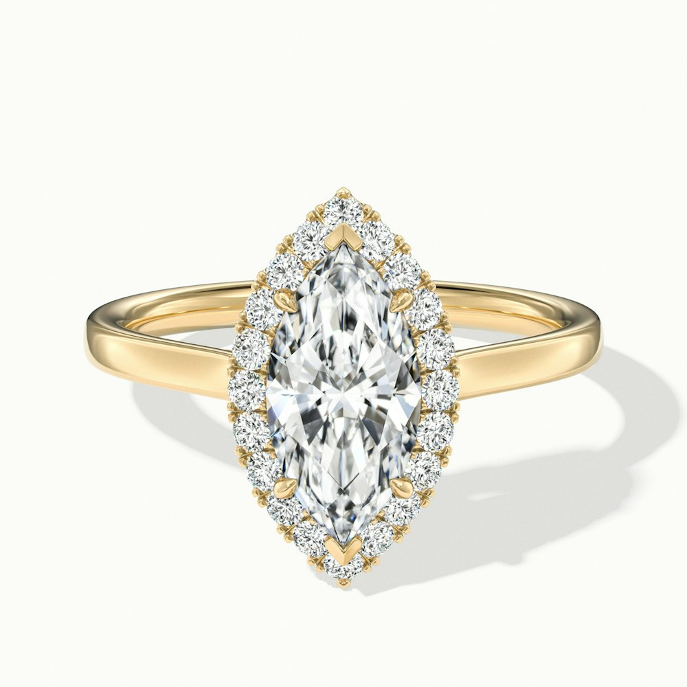 Melanie Marquise Halo Wedding Ring in Yellow Gold, featuring a marquise-cut lab-grown diamond with a diamond halo, also available in both moissanite and lab-grown diamond options.