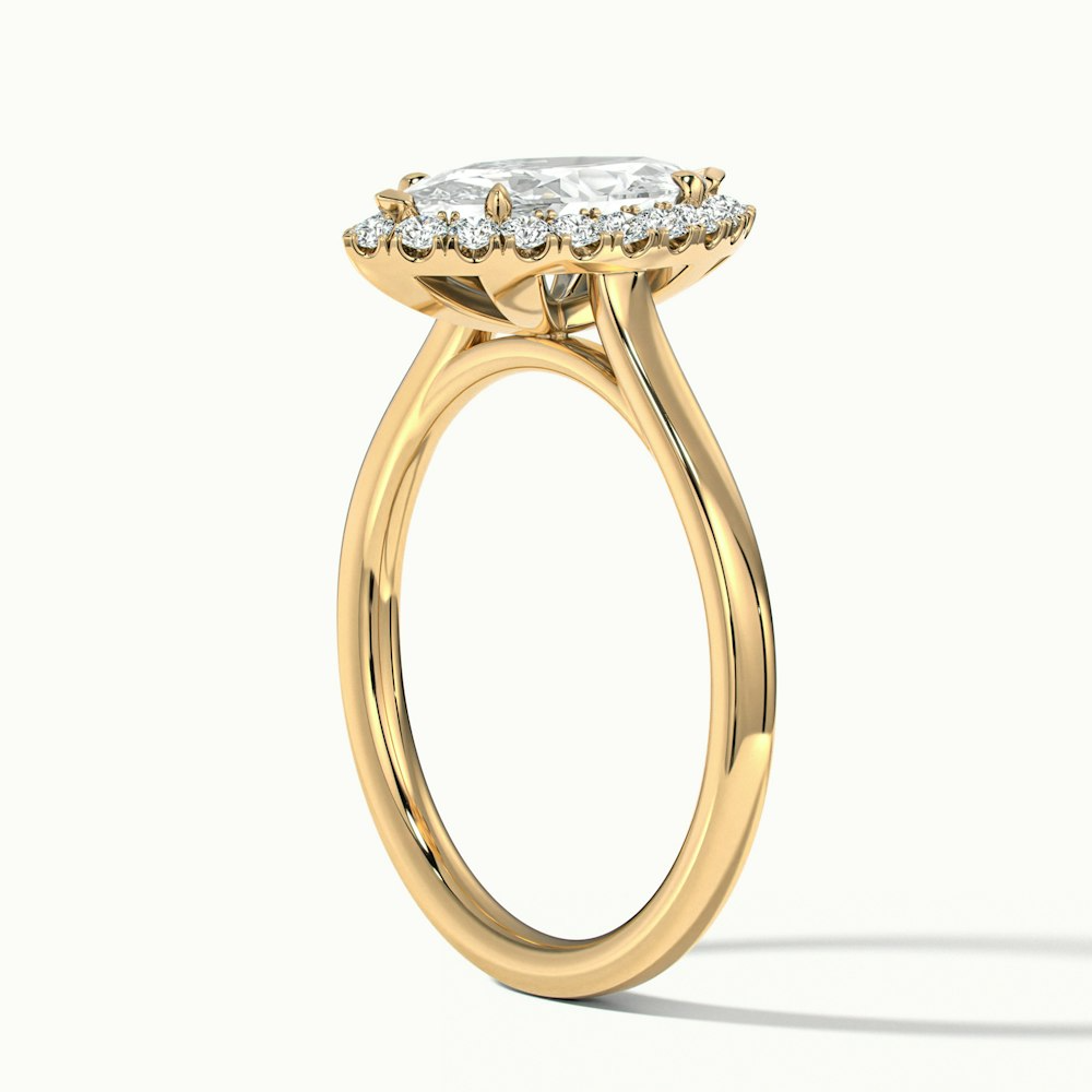 Top view of the Melanie Marquise Halo Wedding Ring in Yellow Gold, with a marquise-cut lab-grown diamond and surrounding halo, also available in both moissanite and lab-grown diamond.