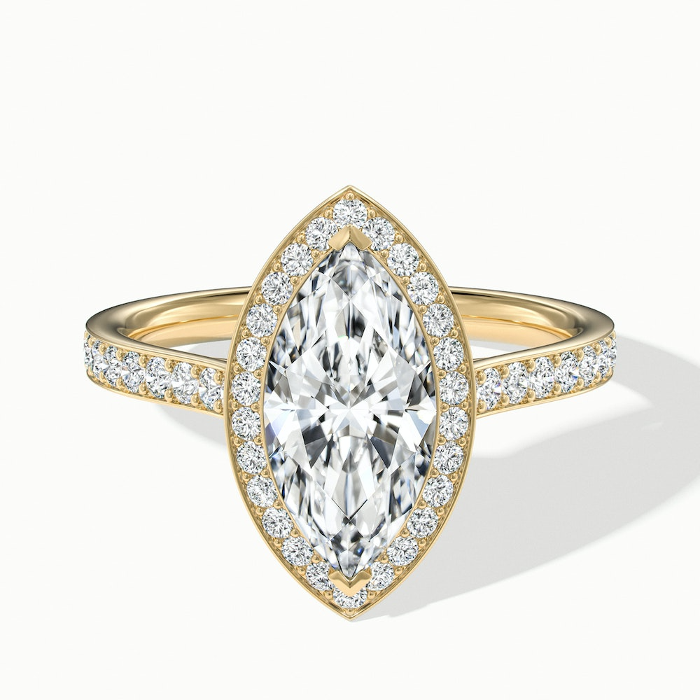 Natalie Marquise Halo Channel Set Wedding Ring in yellow gold with a sparkling marquise cut diamond and channel set diamonds, available in both moissanite and lab-grown diamond