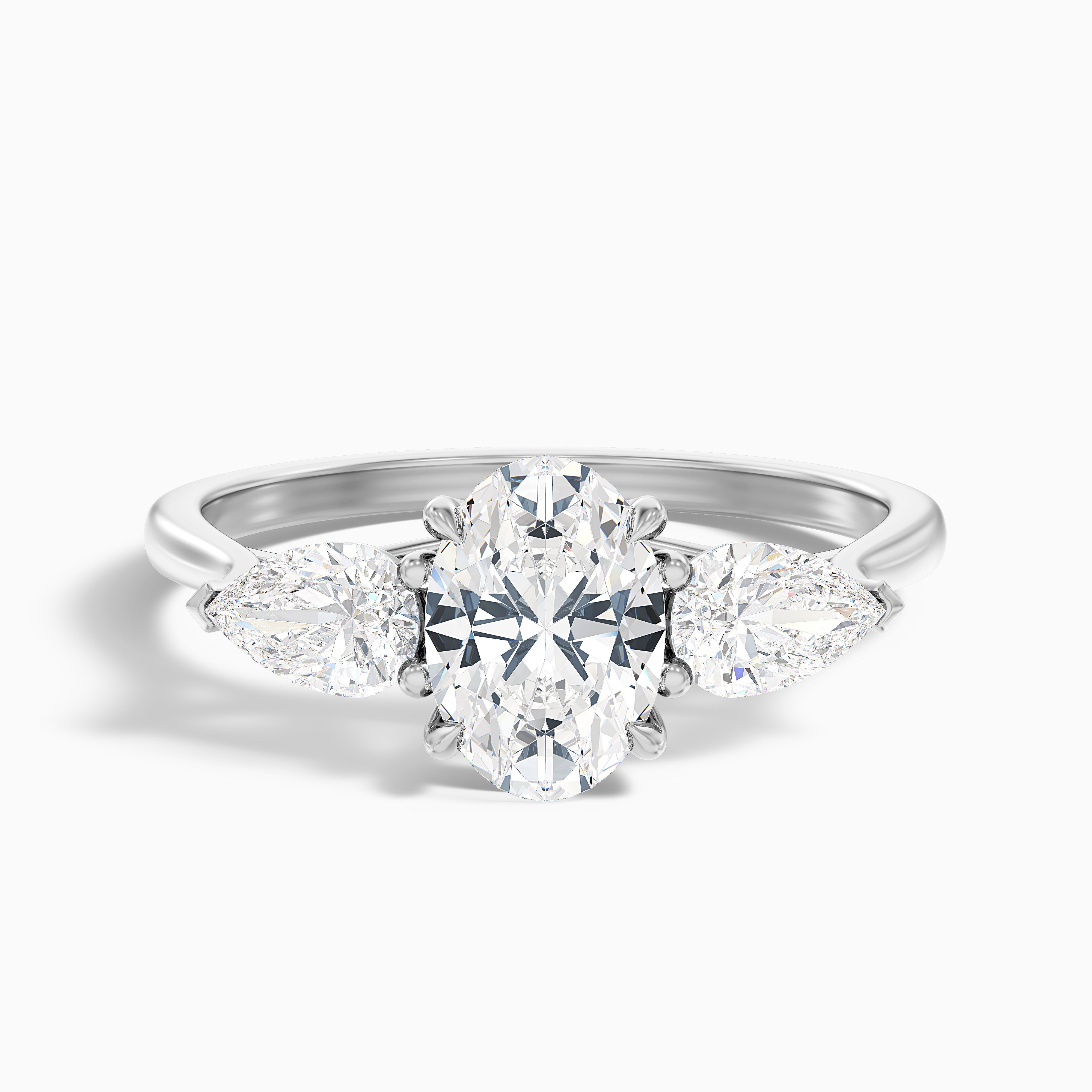 Marcella Oval Three Stone With Pear Moissanite Ring