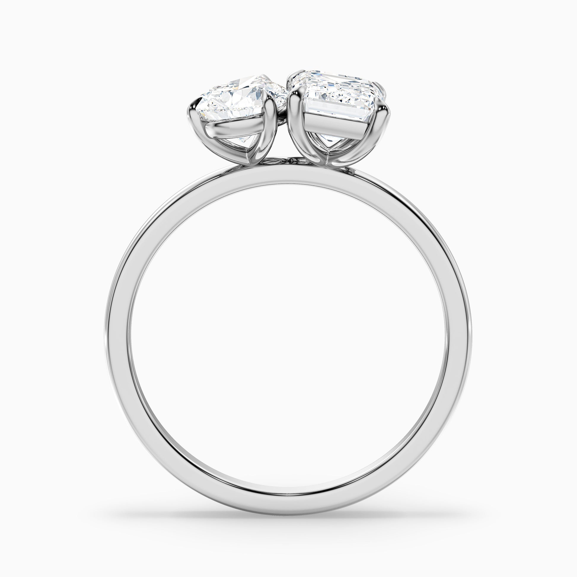 Elegant Cecelia Toi Et Moi engagement ring in white gold and platinum with pear and emerald cut diamonds, available in moissanite and lab-grown diamond variations