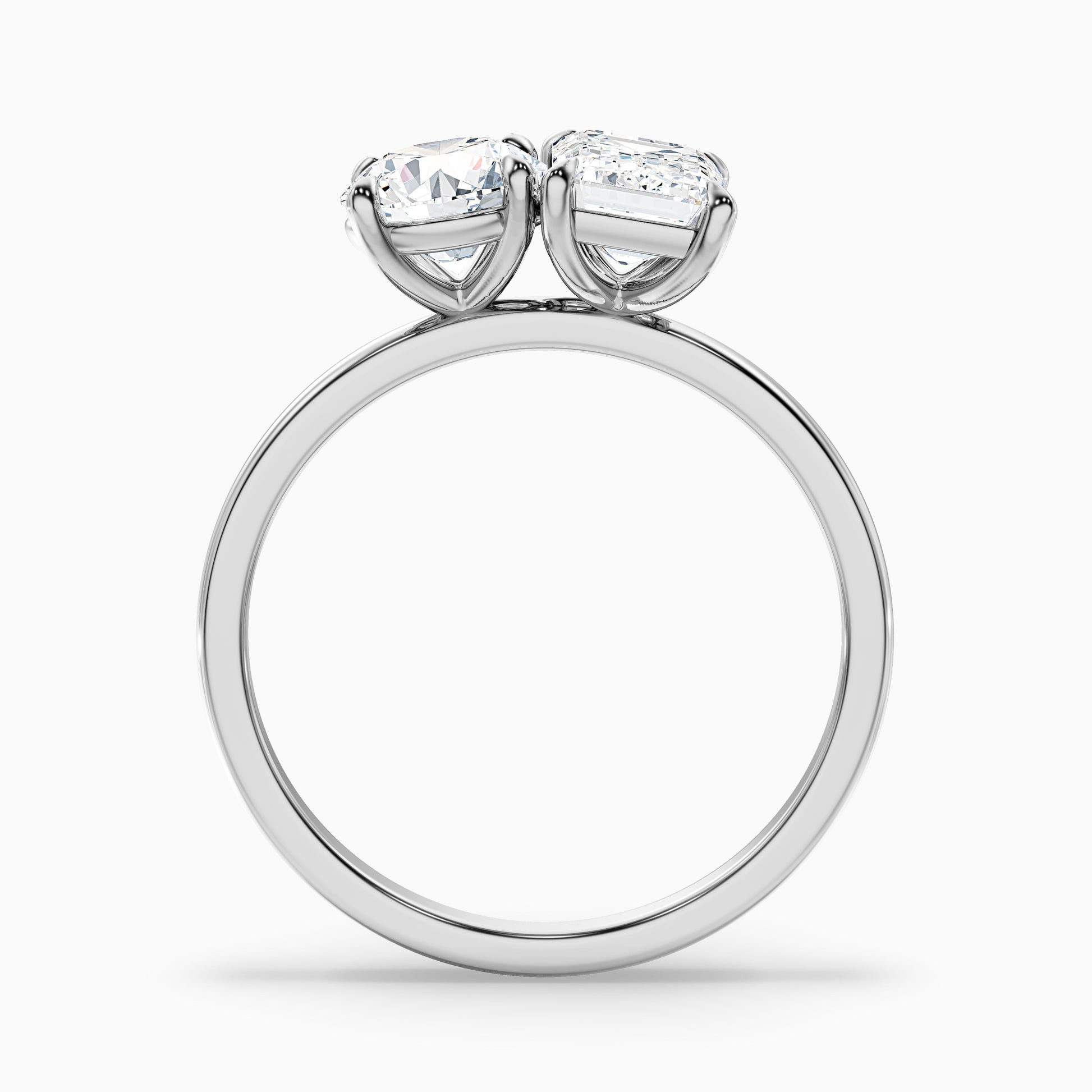 Joanna Toi Et Moi Diamond Ring in White Gold and Platinum with Round and Emerald Cut Diamonds, available in Moissanite and Lab-Grown Diamond. A modern engagement ring design