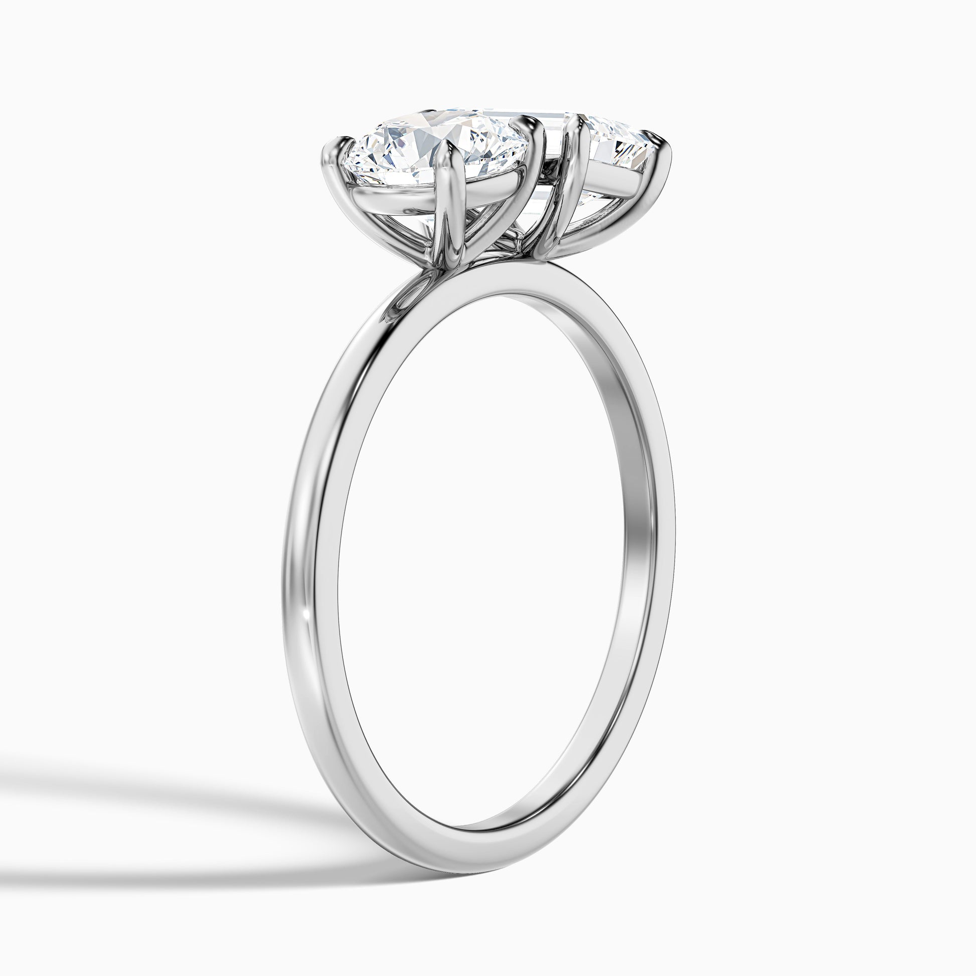 Joanna Toi Et Moi Diamond Ring in White Gold and Platinum with Round and Emerald Cut Diamonds, available in Moissanite and Lab-Grown Diamond options. Elegant, luxurious engagement ring