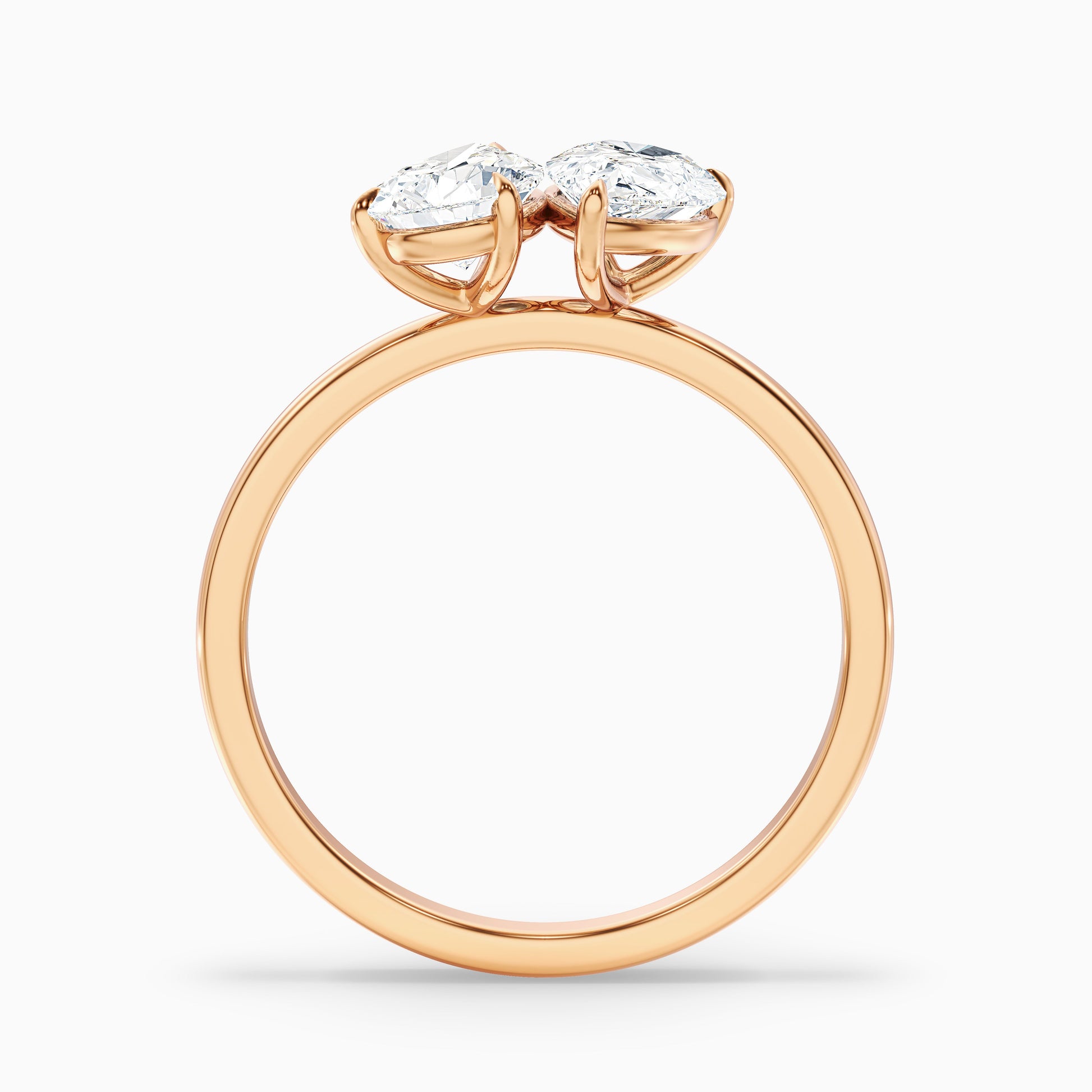 Katrina Toi Et Moi pear-shaped diamond engagement ring in rose gold, available in moissanite and lab-grown diamond choices. Elegant engagement ring for modern brides