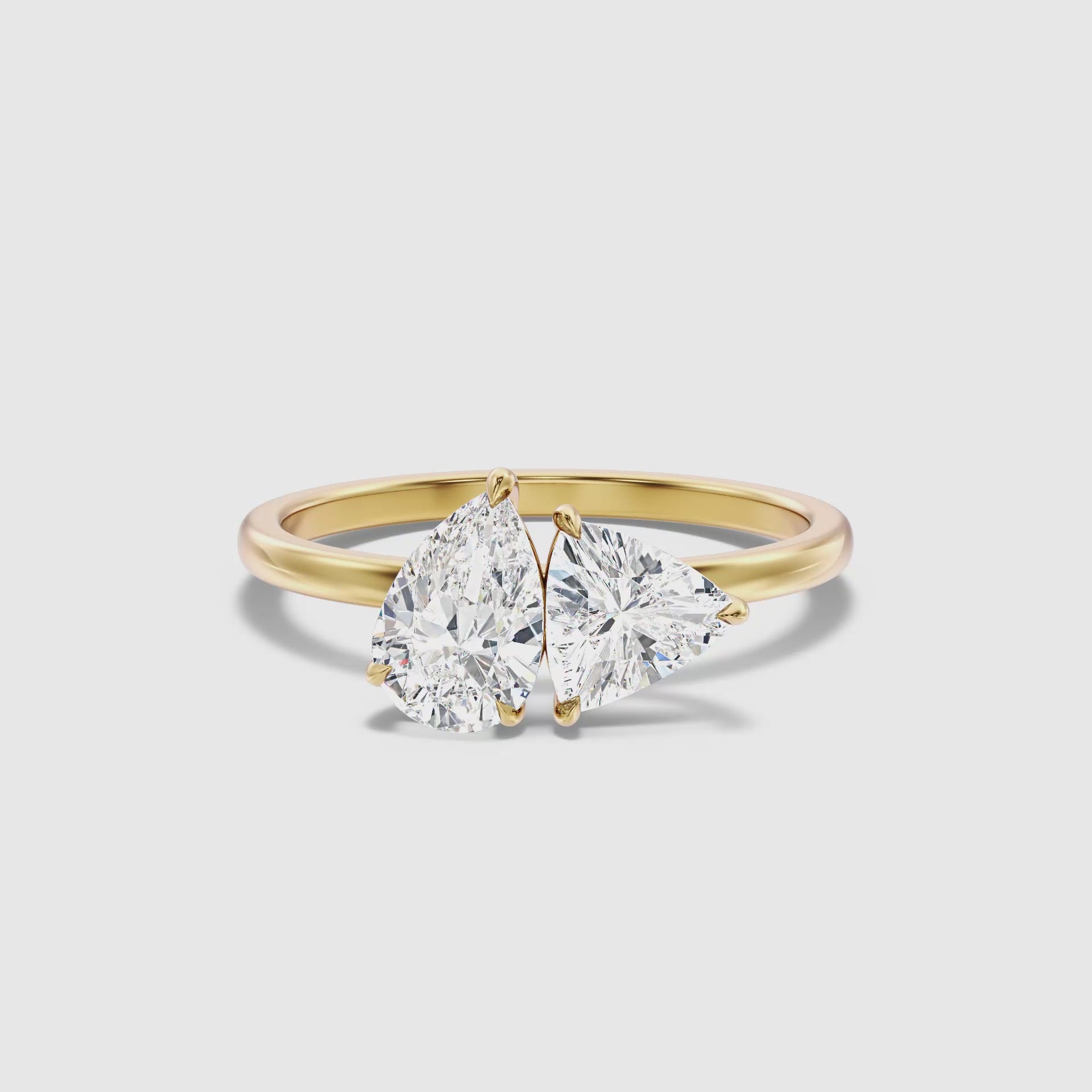 Load video: Naomi Toi Et Moi Diamond Ring With Pear And Trillion Cut Diamonds