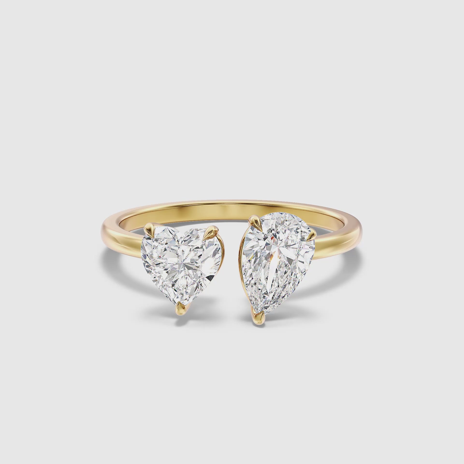 Load video: Crystal Toi Et Moi Moissanite Ring With Heart and Pear Cut Diamonds