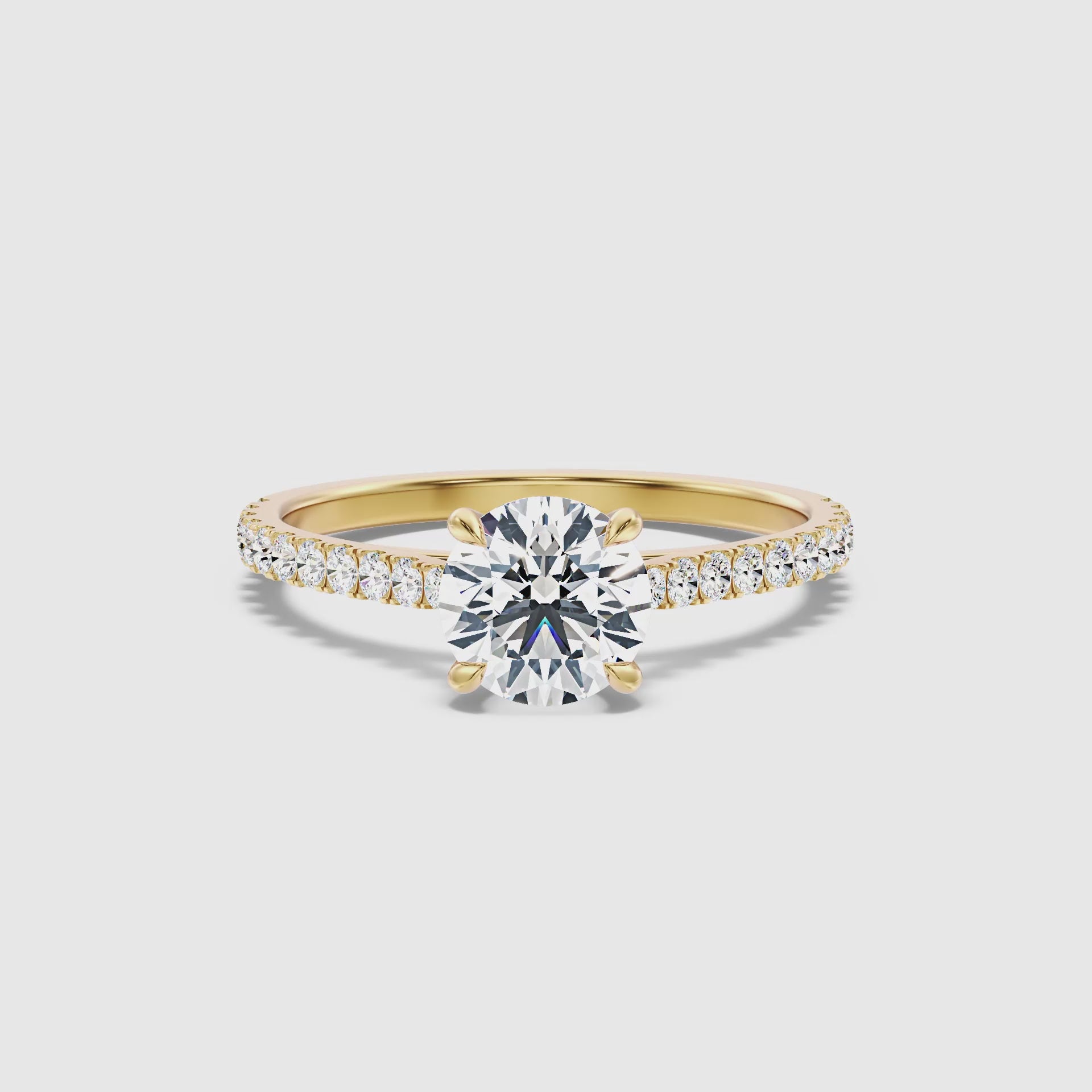 Load video: Calista Round Side Stone Moissanite Engagement Ring