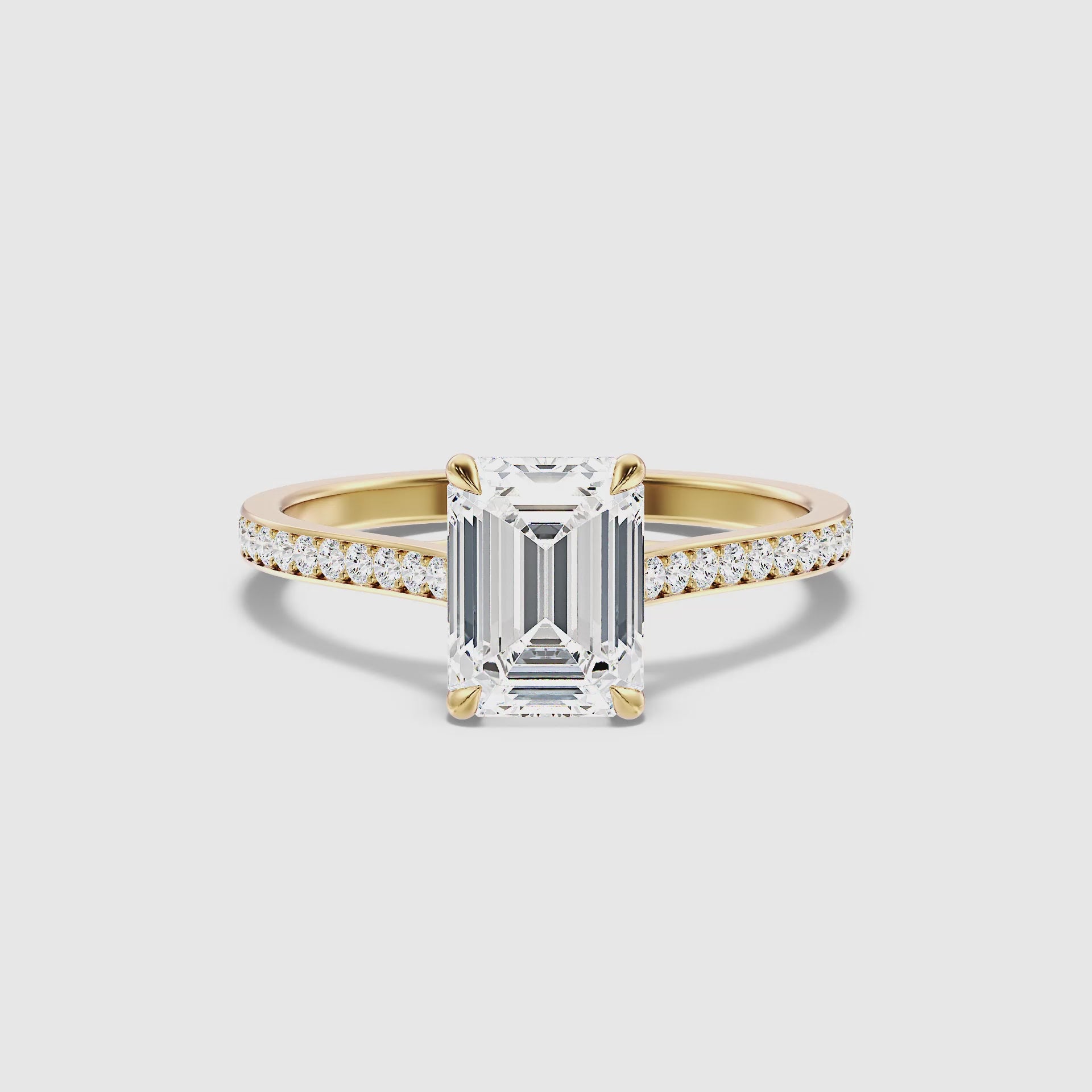 Load video: Bethany Emerald Side Stone Channel Set Moissanite Ring