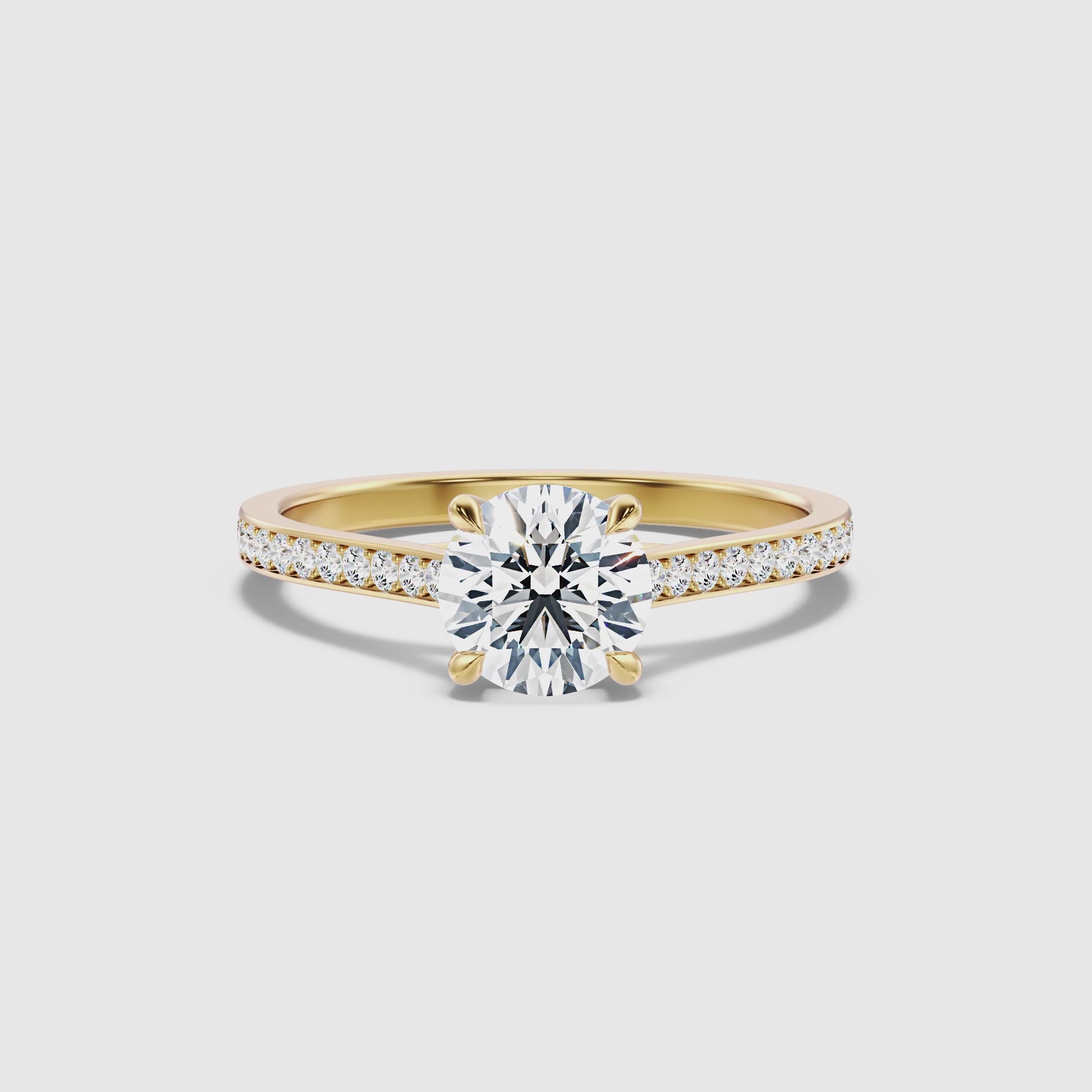 Load video: Serena Round Side Stone Channel Set Moissanite Engagement Ring