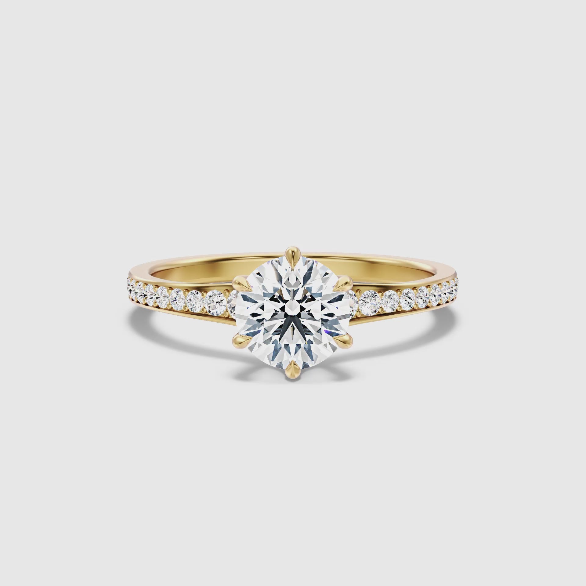 Load video: Madison Round Side Stone Channel Set Moissanite Ring