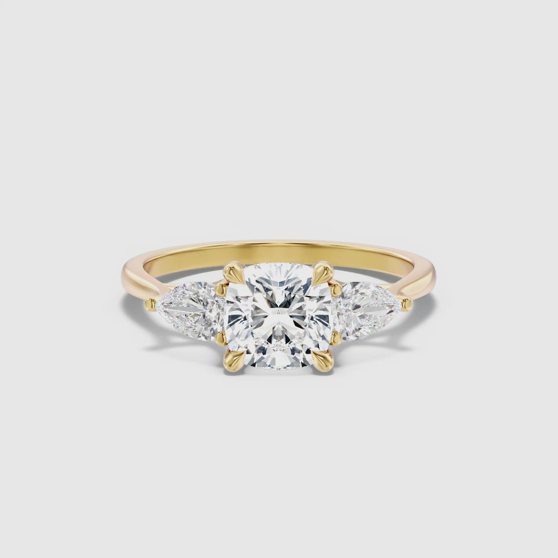Load video: Raelyn Three Stone Cushion Lab Grown Diamond Ring With Pear Side Stone
