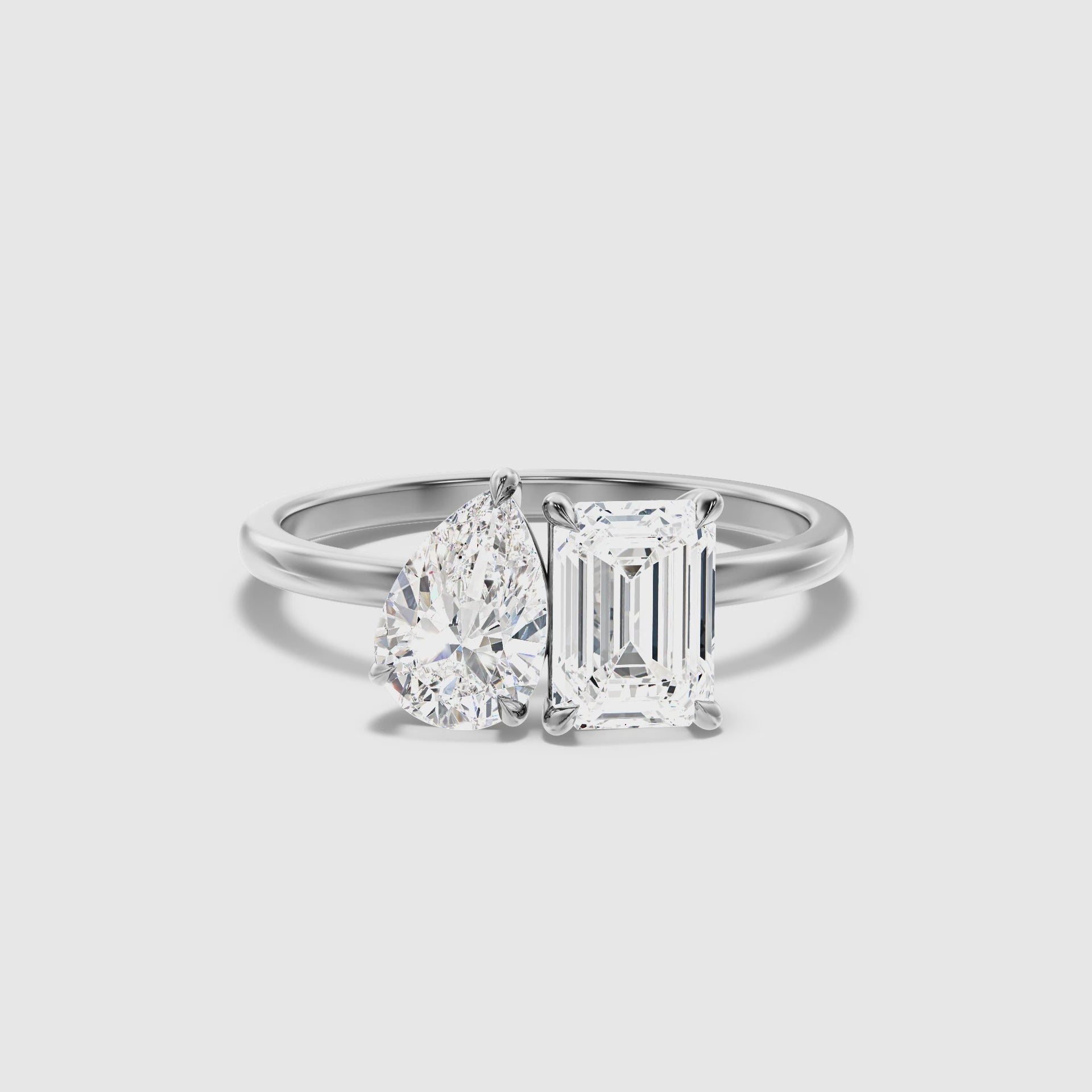 Load video: Cecelia Toi Et Moi Diamond Ring With Pear And Emerald Cut Diamonds