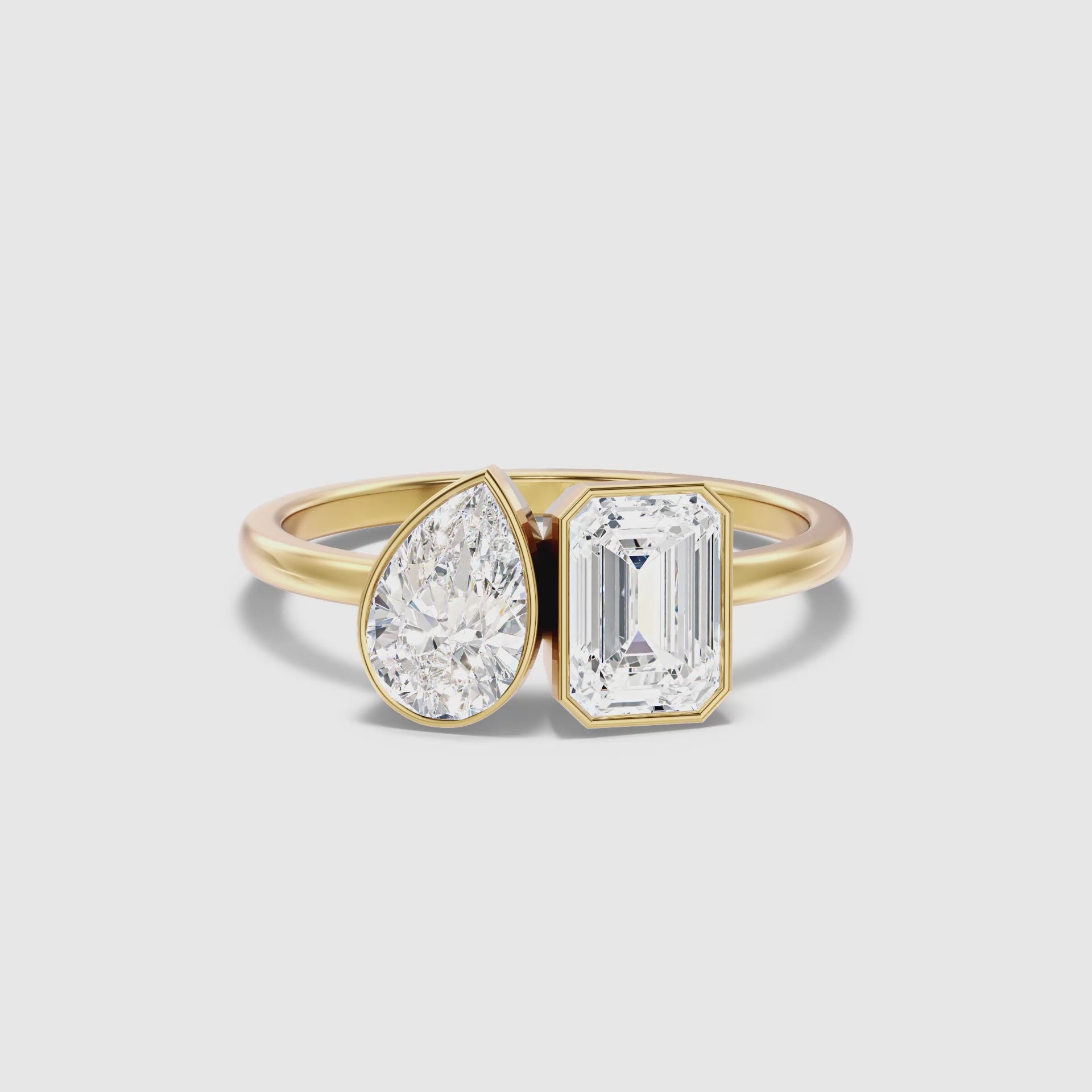 Load video: Helena Toi Et Moi Moissanite Ring With Pear And Emerald Cut Diamonds